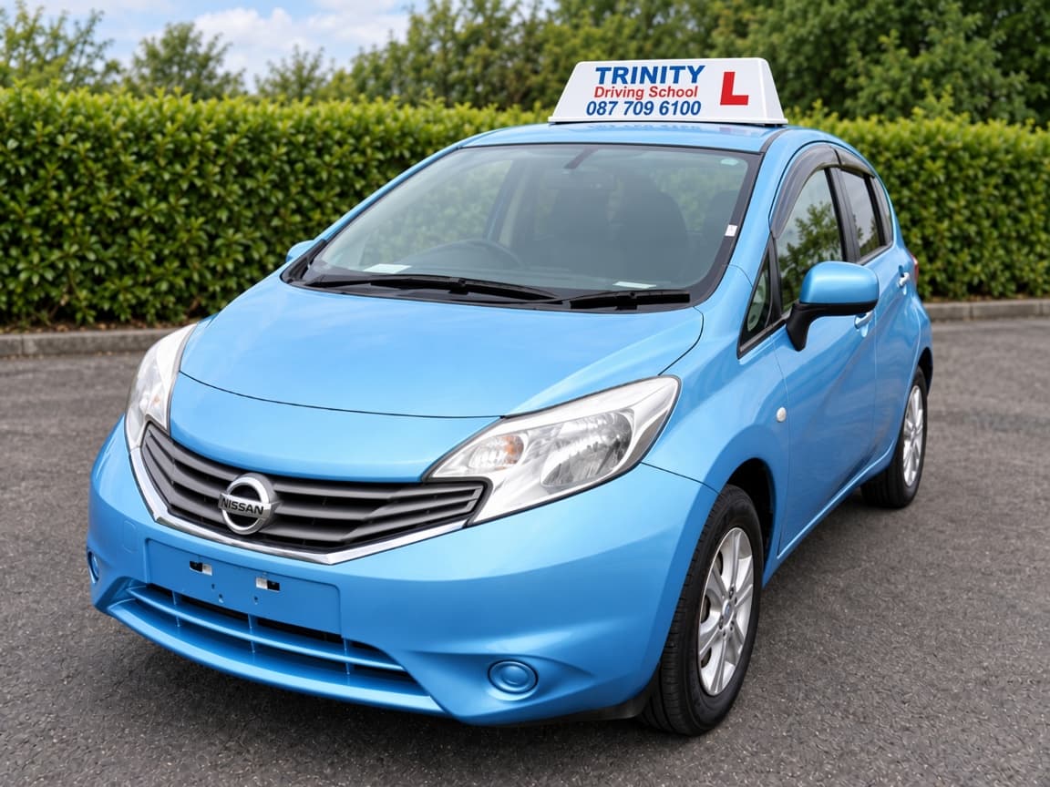 Blue Trinity Driving School training car used for automatic lessons.